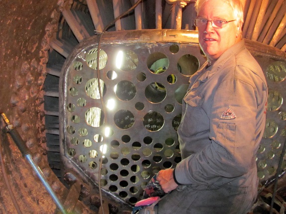 Brother Brent Graham, in the smoke box, welded the new tube sheets in place.